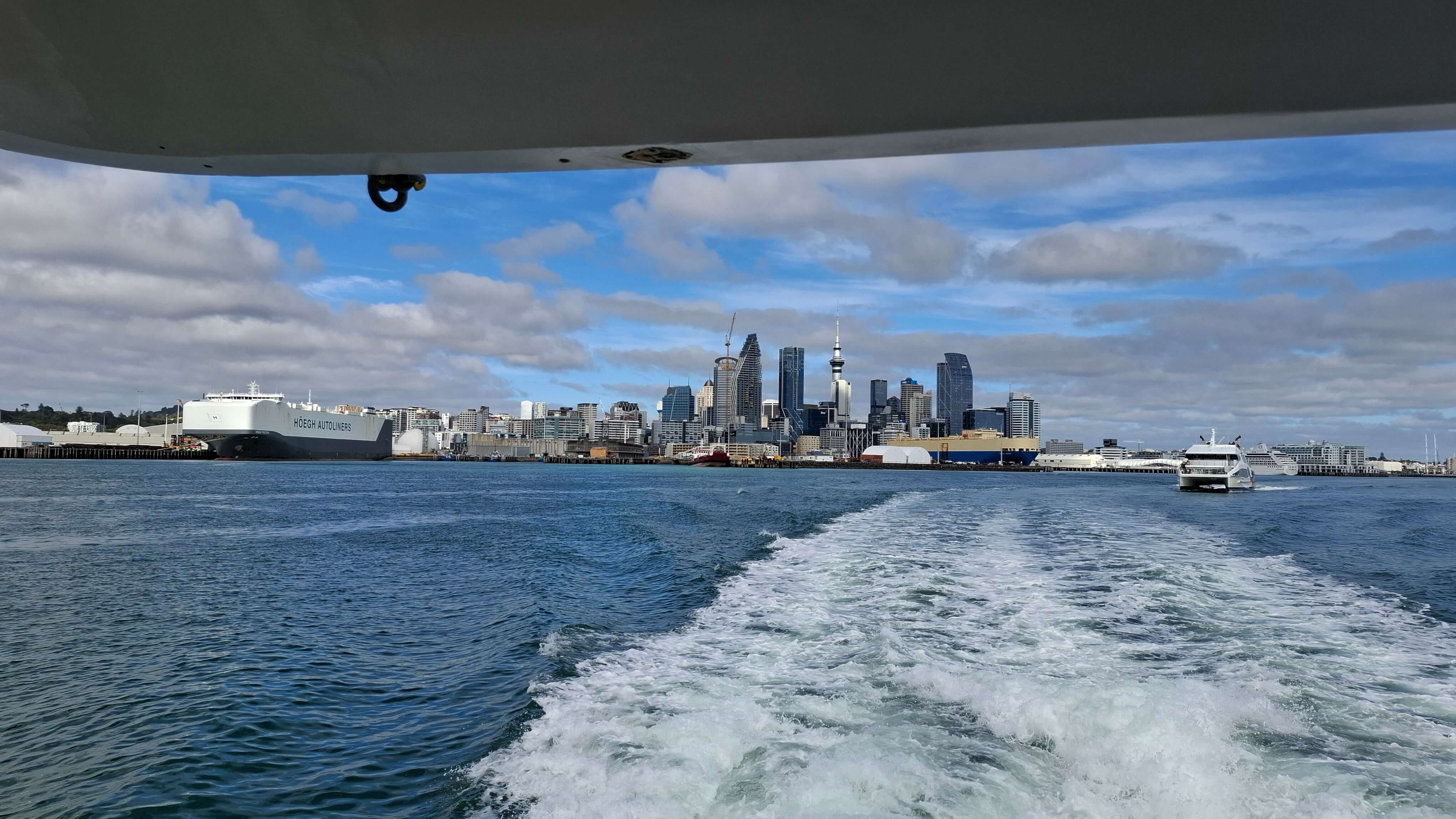 Auckland's skyline, as seen from a ferry in the Waitematā Harbour.